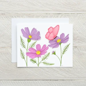 A card depicting a trio of cosmos flowers in shades of purple with green leaves and a pink butterfly on a white background.